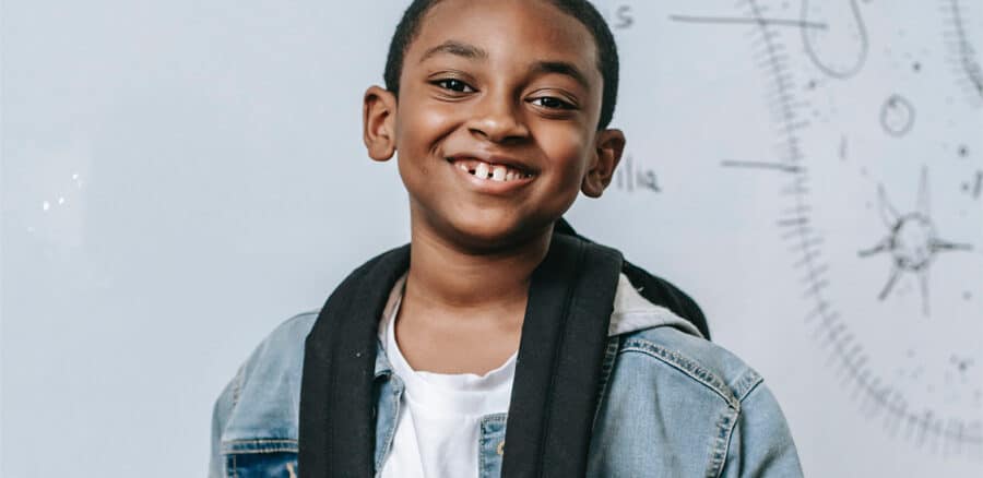 Smiling boy, can kids get gum disease