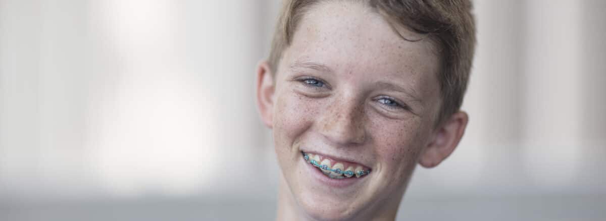 Portrait of a smiling boy with braces