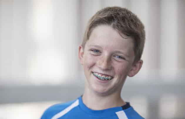 Portrait of a smiling boy with braces